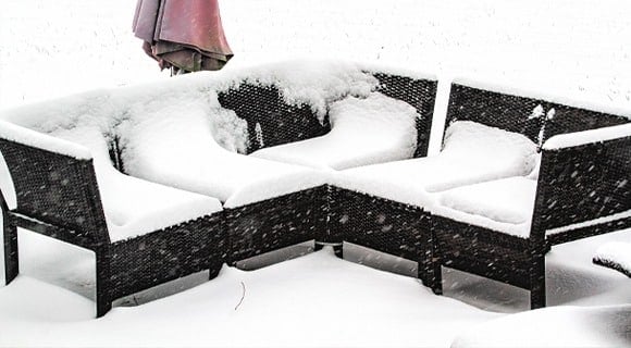 Snow on Outdoor Furniture Needing Upholstery Cleaning in Fairport, NY